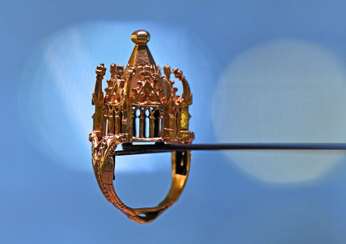 A Wedding Ring Shaped Like a Tiny House (Because Why Not?)