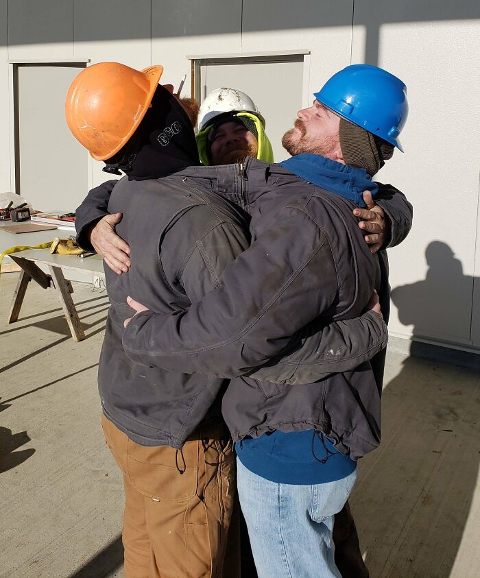 Three Coworkers, One Coat—Fashion Statement or Survival Trick?