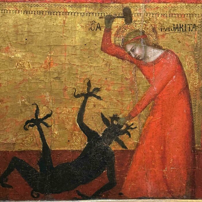 St. Margaret Of Antioch Walloping The Demon Beelzebub With A Hammer. From The Paintings Of The Mystical Marriage Of St. Catherine, Circa 1340