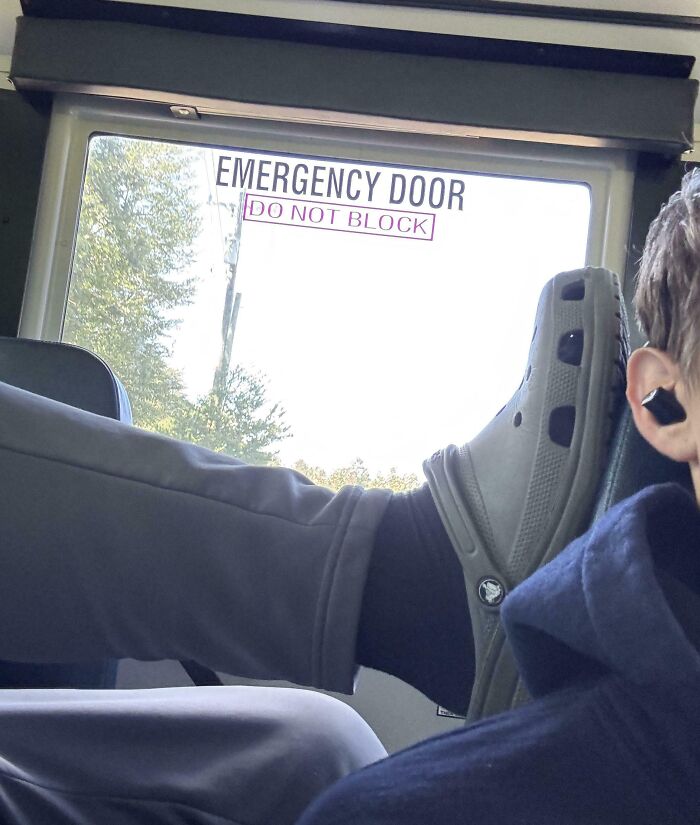 Feet Alert! Guy Plants His Feet Right Next to Someone’s Head on the Bus