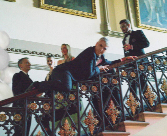 George Clooney Slides Down the Banister