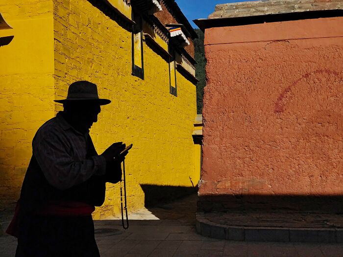 Honorable Mention, Street Photography: 'Light & Shadow' by Kuanglong Zhang