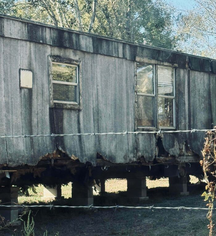 Neighbor Moved A Rotten Old Mobile Home Right Next To My Fence