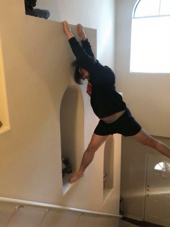 Once Thought Cats Were Evil, Now Scaling Walls To Kiss One