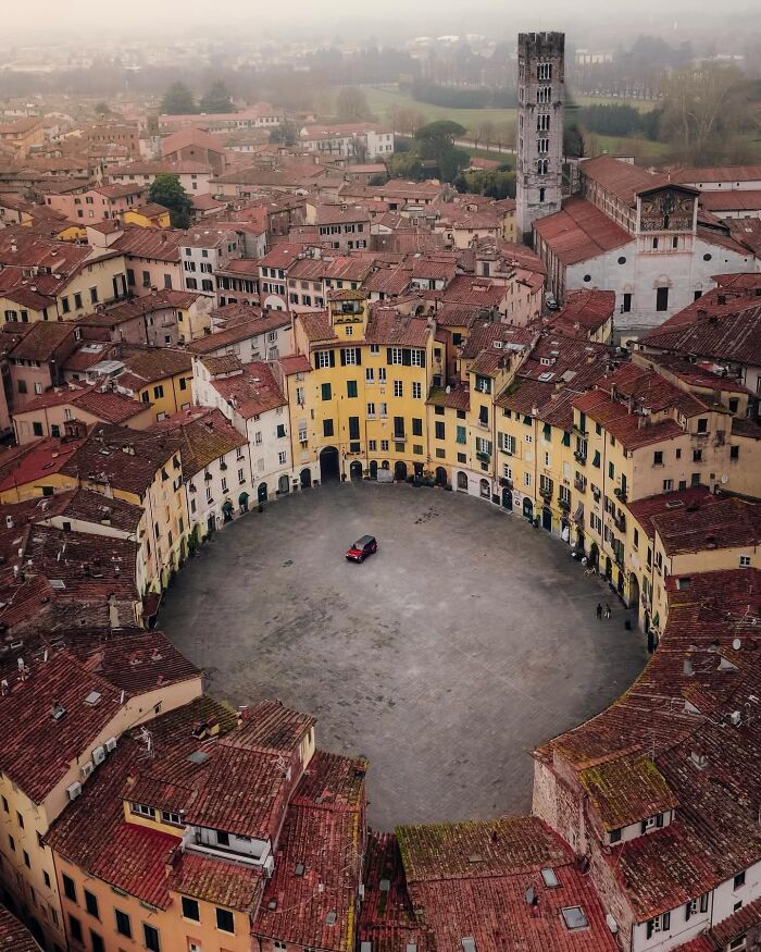 The Oval Piazza That Used To Be A Roman Amphitheater In Italy