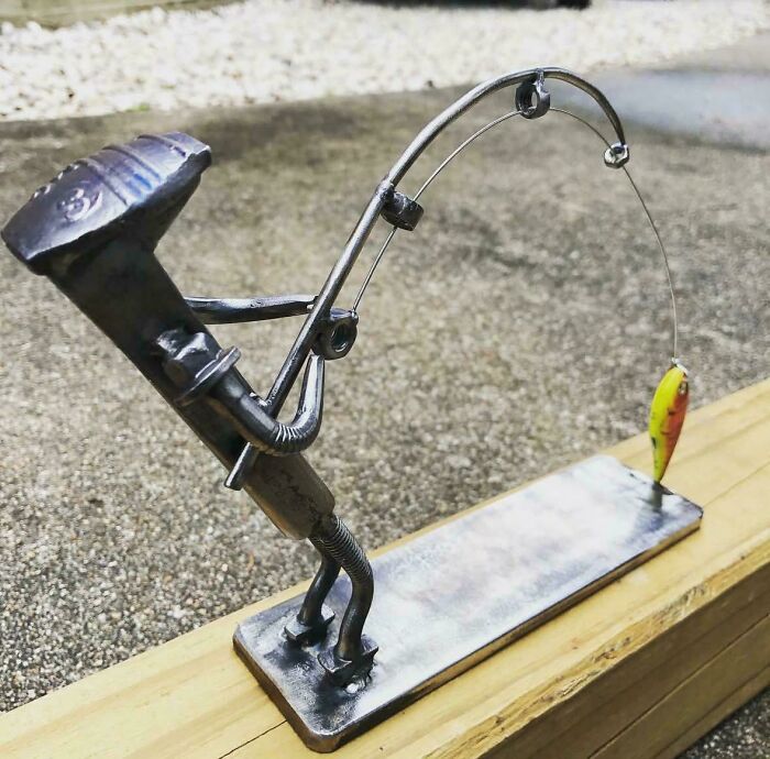 Forged a Railroad Spike Fisherman Sculpture—Industrial Art at Its Best