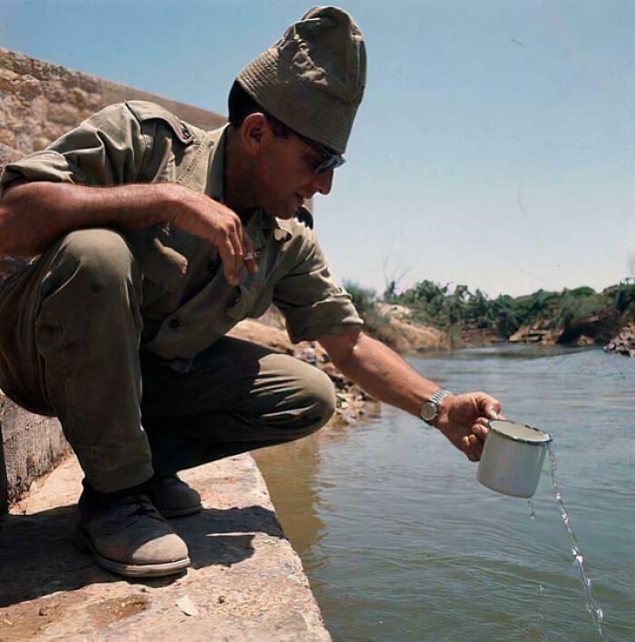 Israeli Soldier Hydrates from the Jordan River After Six-Day War, 1967