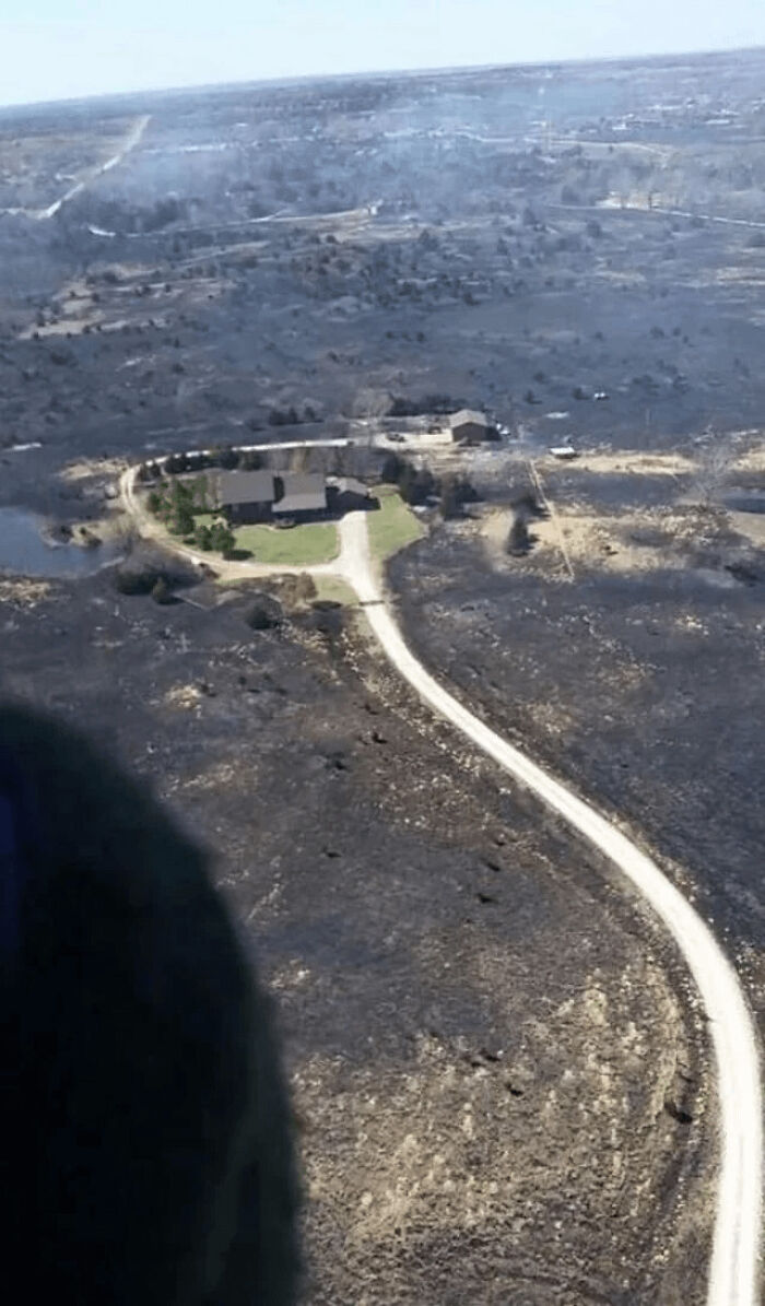 Kansas Man Turns On Sprinklers Before Evacuating from Wildfire, Comes Back to This!