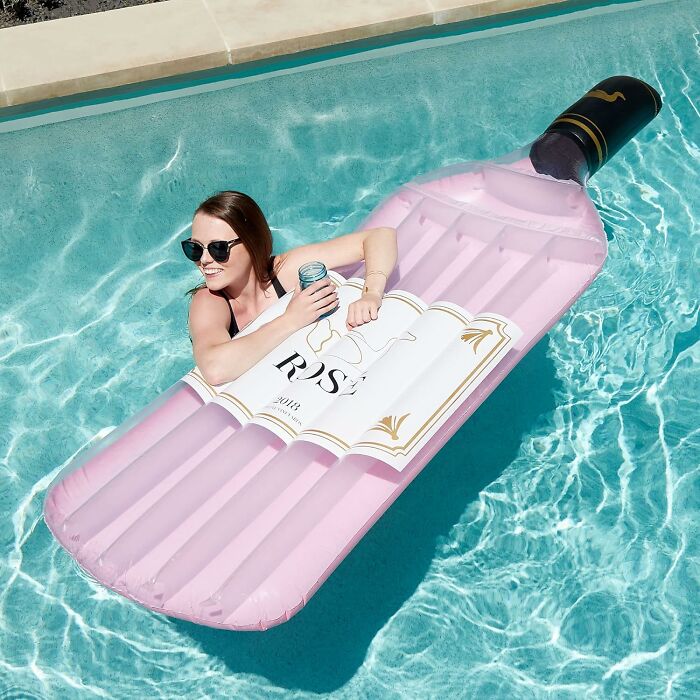 Not Going to the Mediterranean? Float Like a Boss on a Rosé Bottle Pool Floatie—Because Why Not?
