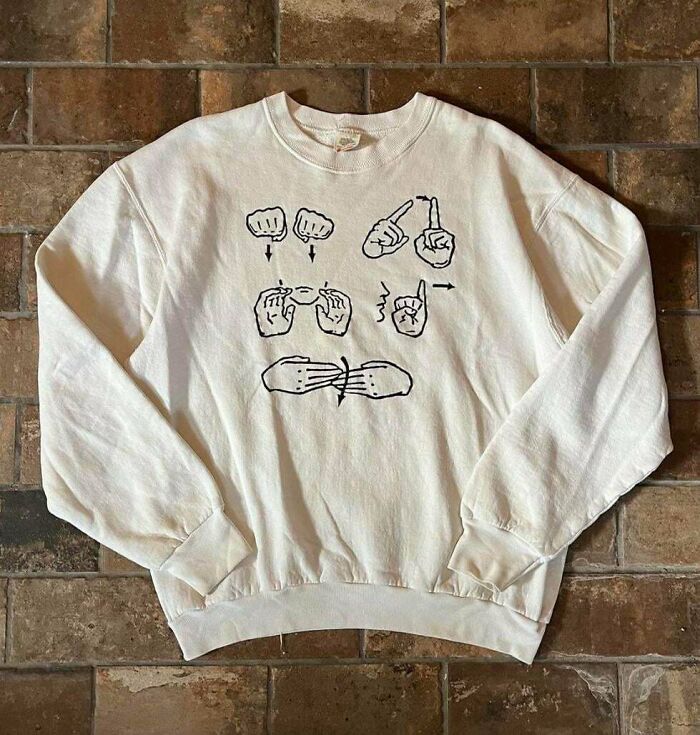 What The Heck Does This ASL Sweater Say?