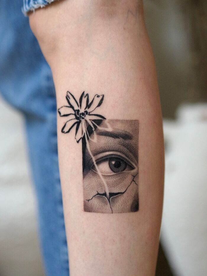 Cracked Frame Meets Hopeful Daisy