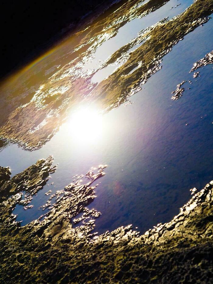 Puddle at Sunset That Doubles as a Mirror