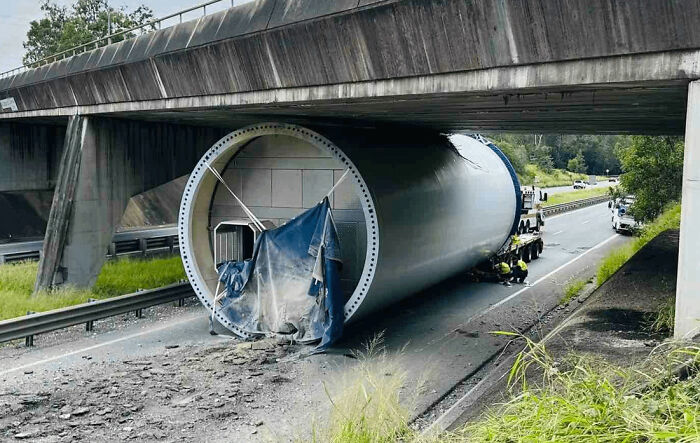 Wind Turbine Truck Meets Low Bridge. Bridge Wins.