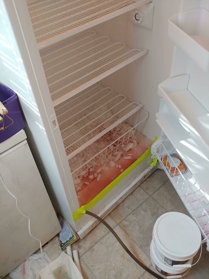 Defrost Your Freezer Mess-Free With Just a Hose and Some Tape