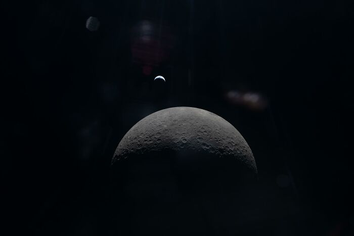 Crescent Earth Hanging Over Moon’s Horizon