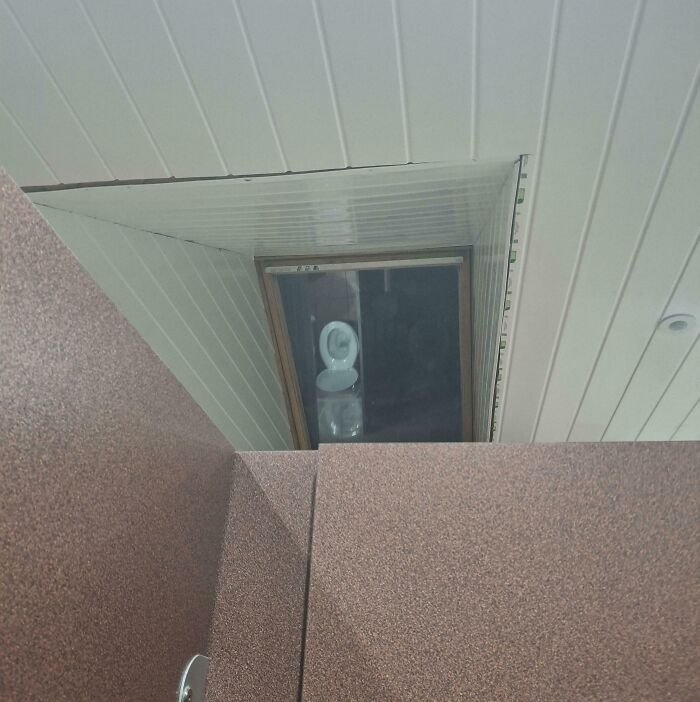 At Night, This Window Lets Everyone Peek Into Your Cubicle
