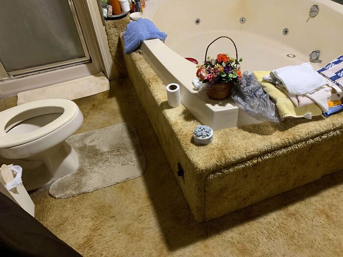 Bathroom Covered in Carpet. Ew.