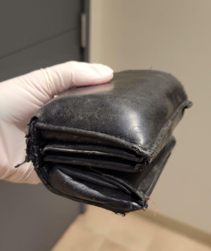 This Guy at Work Has the Ultimate Dad Wallet—It’s Huge!