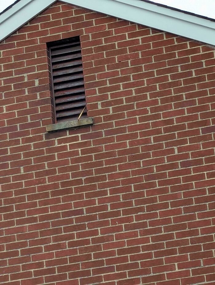 What’s Up With This Hose Spitting Water Out Of An Attic Window?