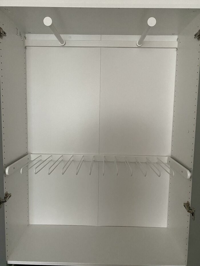 How Do I Organize Clothes In This Funky Cabinet?