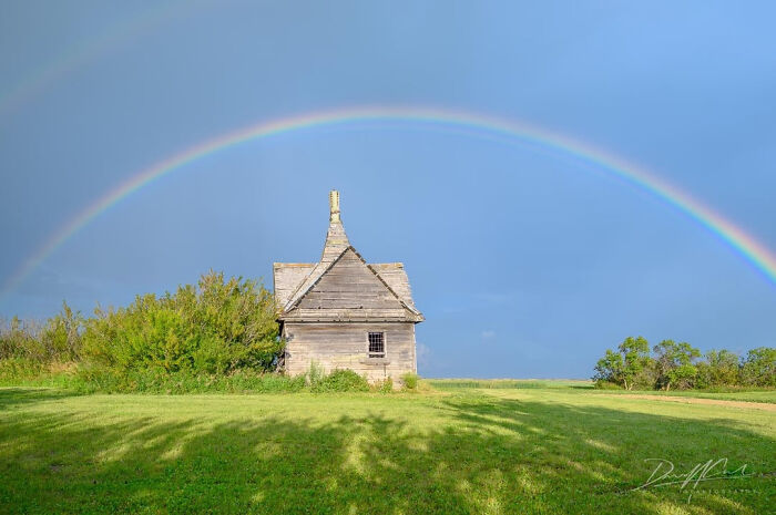 Rainbow Magic Over an Abandoned Cabin in Alberta