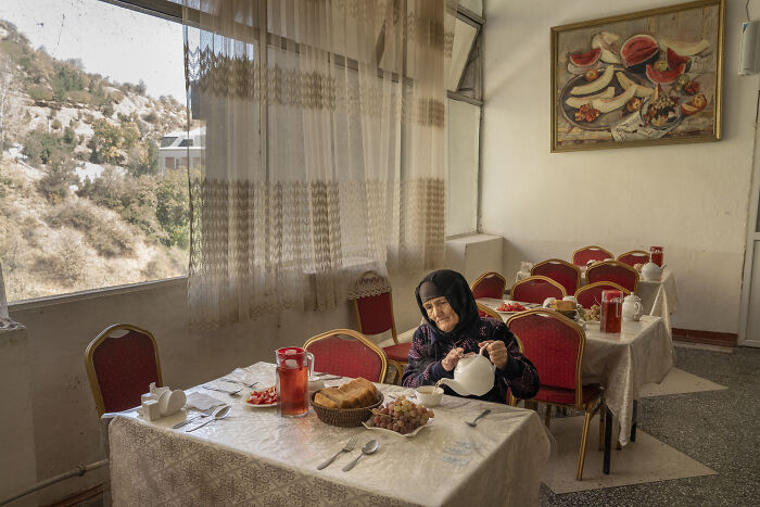 Big Winner: A Woman Grabs a Bite at a Soviet-Era Sanatorium Canteen By Jo Kearney, UK
