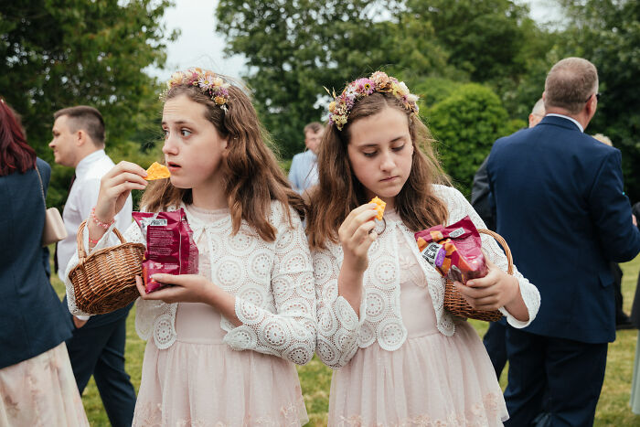 Champagne Taittinger Wedding Food Photo: Twin Bridesmaids Munching Canapés By Emma Stoner, UK