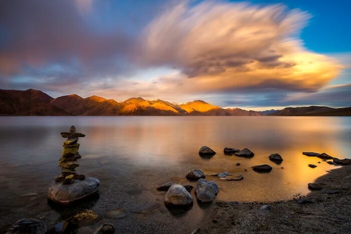 Solitary Balance Pangong Sunset: Stones And Stillness