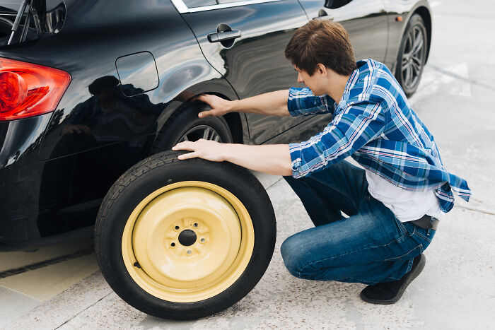 Flat Tire, No Shoulder, Pouring Rain—Then A Complete Stranger Stopped To Help