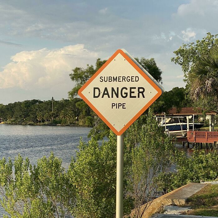 Danger: Pipe Is Submerged, So Keep Your Feet Dry!