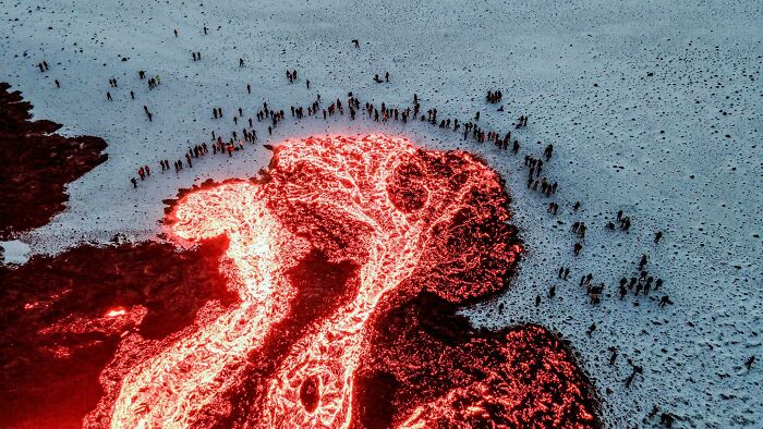 Brave Spectators Getting Cozy Near A Lava Flow At Fagradalsfjall Volcano
