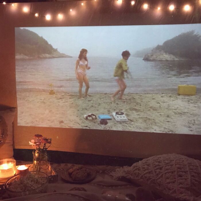 Portable Projector = Dad Turns A Wall, Fence, Or Bedsheet Into A Movie Theater Anywhere