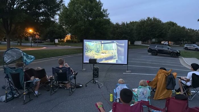 Movie Night Just Got Epic with This 120-Inch Projector Screen That Comes with Its Own Stand