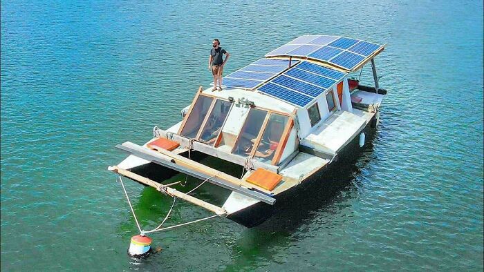Guy Turns a $5k Old Catamaran Into Solar-Powered Floating Home
