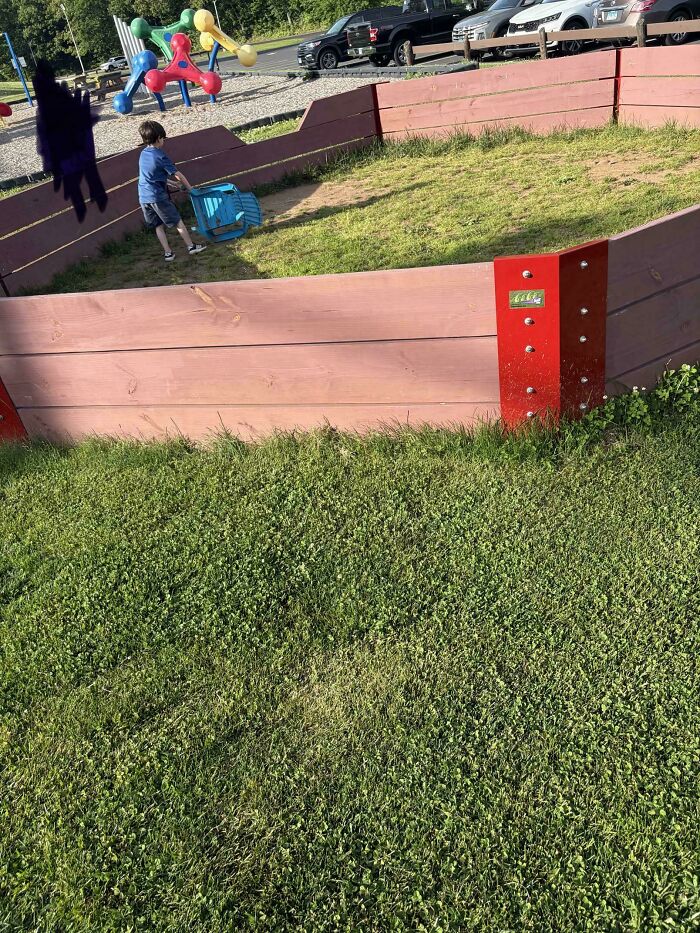 Kid Has Whole Playground but Prefers the Pit and a Chair