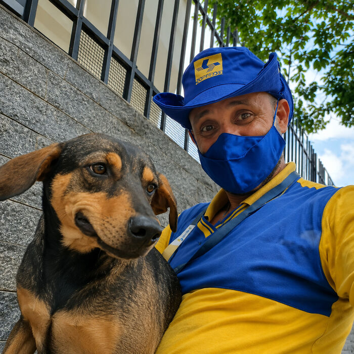 Meet the Mailman Dogs Actually Cheer For (Yep, It’s a Thing!)