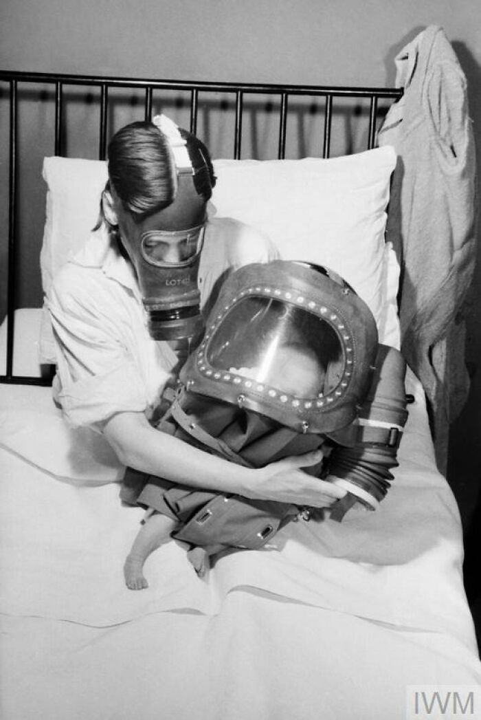 Mom And Baby Rocking Gas Masks, 1941
