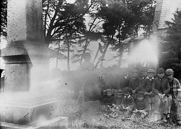 Gang Of Boys In The Churchyard