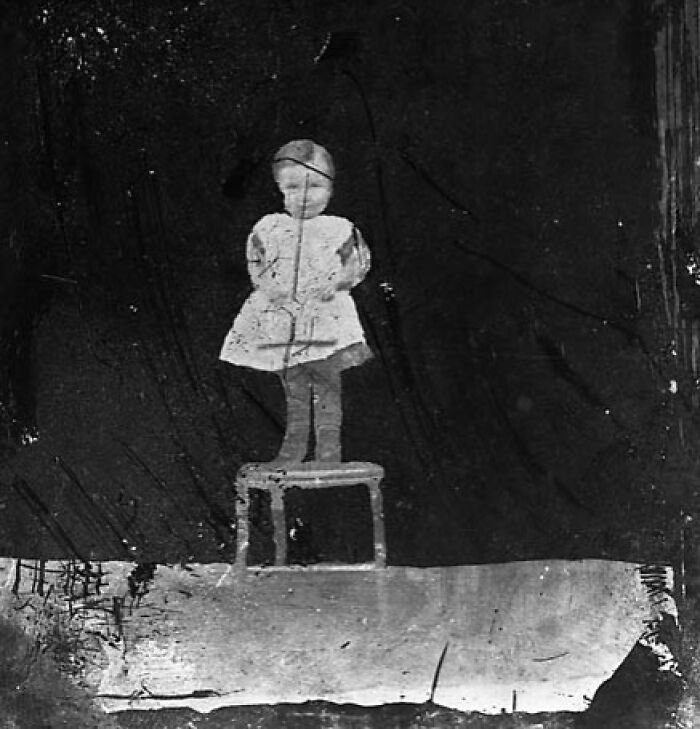 Kid Standing On A Chair (Why?)