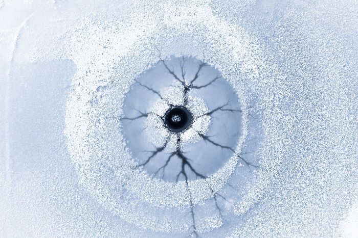 “Frozen Eye On The Lake” By Koki Dote