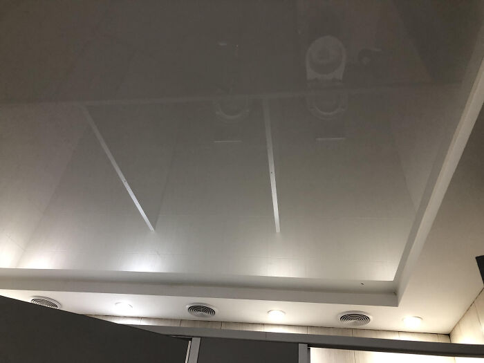 This Public Restroom Ceiling Looks Like A Mirror... Or Does It?