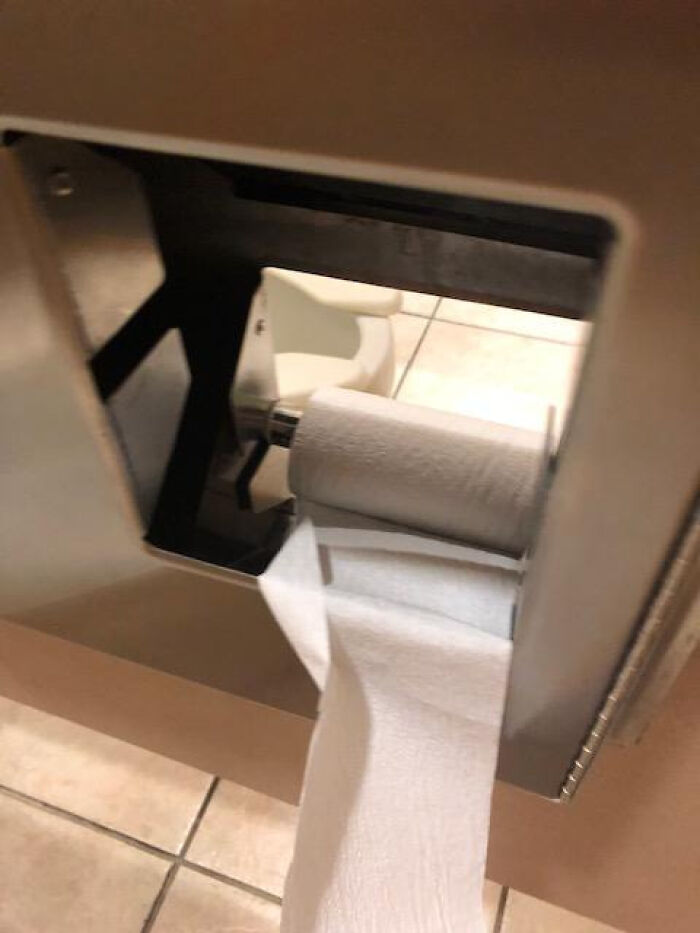 There’s A Hole Between Stalls In This Bathroom. Nope.