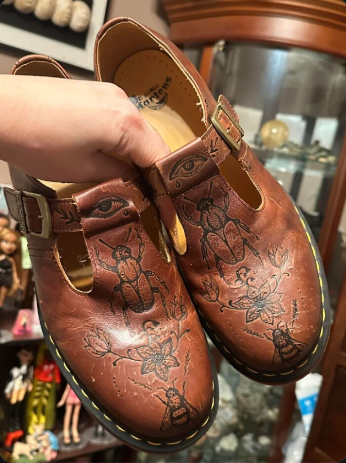 Someone on the Doc Martens sub burned in cool designs on their boots, and wow, these are fire.