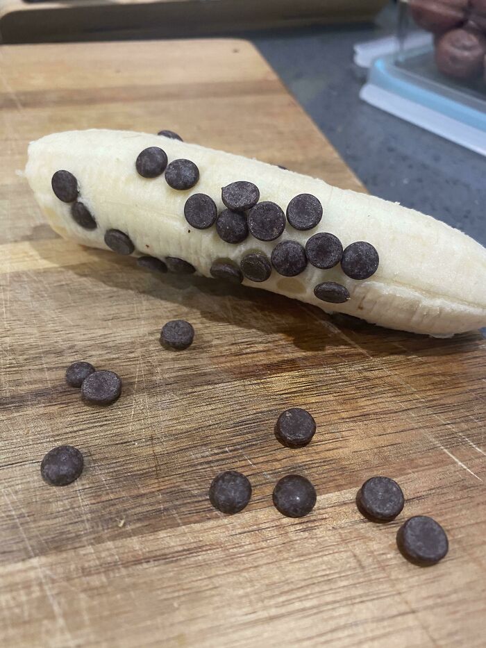 A Banana Rolled In Vegan Chocolate Chips. Fancy Snack!