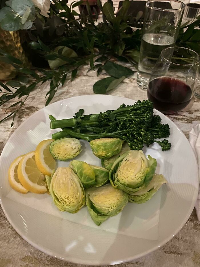 Raw Broccoli, Brussels Sprouts, And Lemon Wedges Wedding Meal. Raise You!