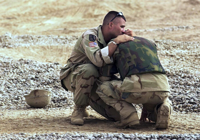 Two US Soldiers Comfort Each Other After a Gut-Wrenching Moment in Iraq, 2003