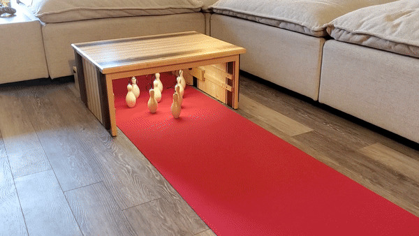 Coffee Table That Turns Into a Bowling Lane. No Joke.