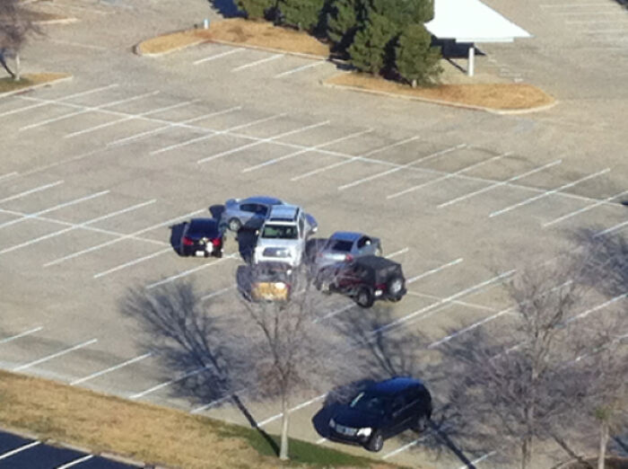 When You Take Not One, but FOUR Parking Spots… and Still Park Like This