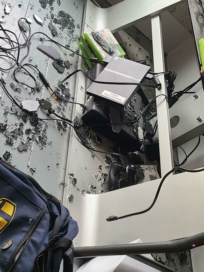 TV Stand Glass Shelf Explodes While Away