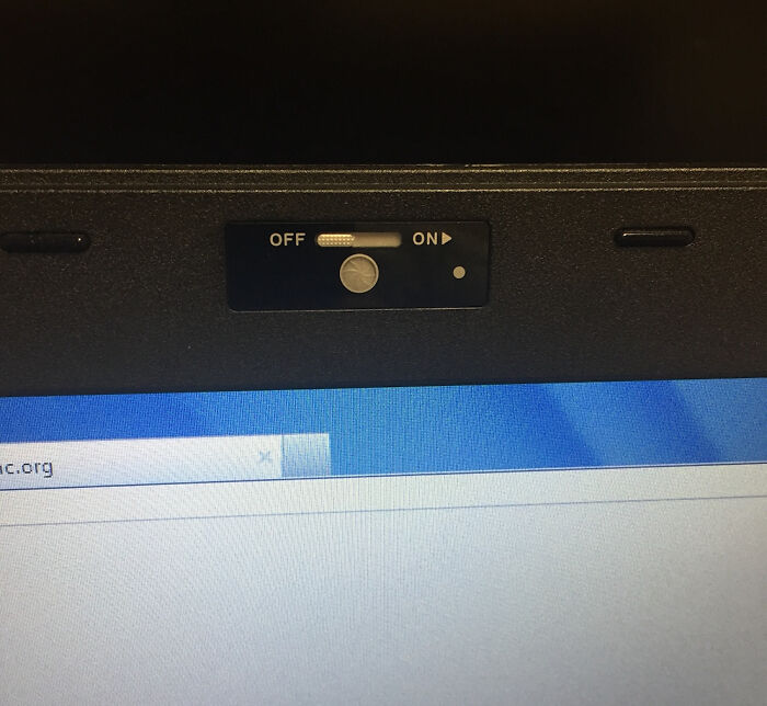 Work Laptop with a Webcam Cover for Privacy Heroes